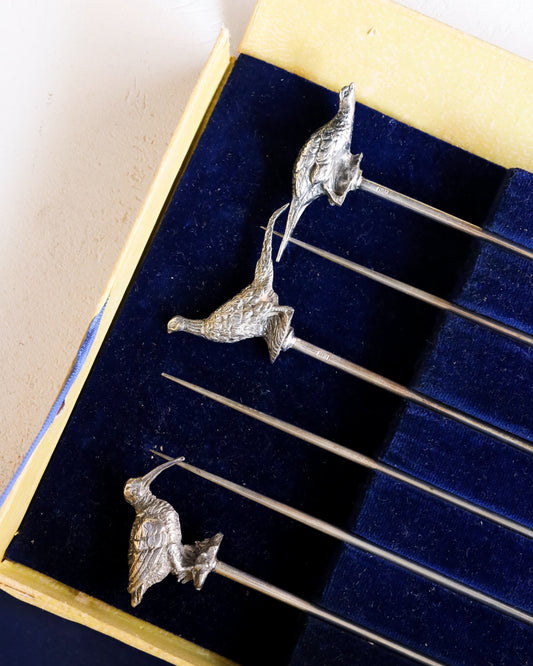 Spiedini bagnati in argento