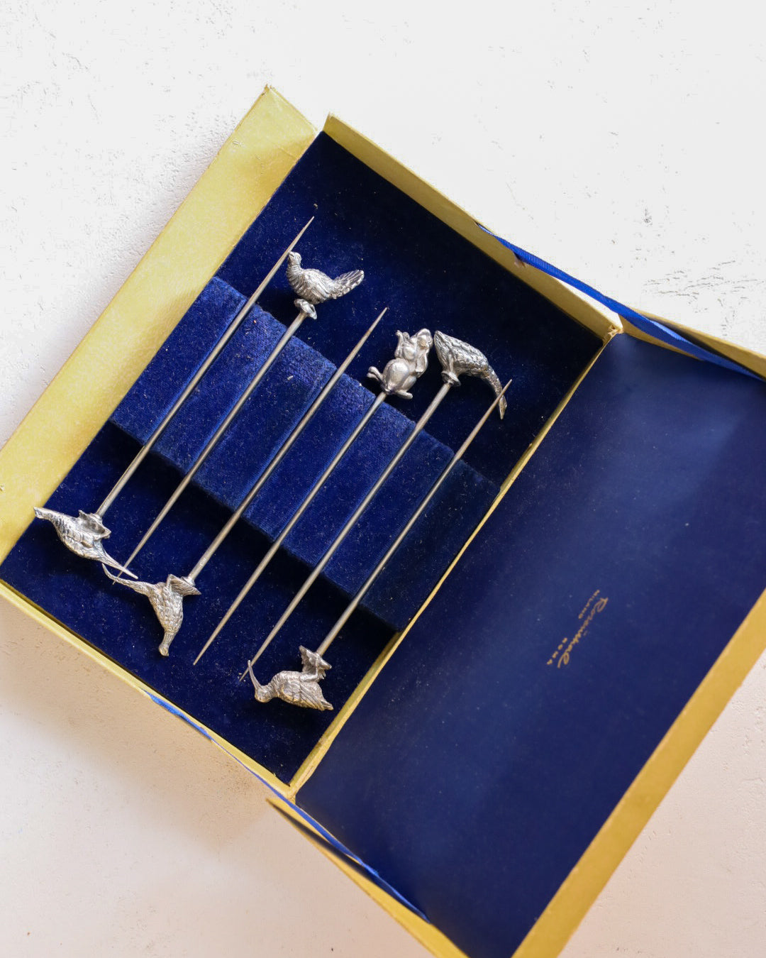 Spiedini bagnati in argento
