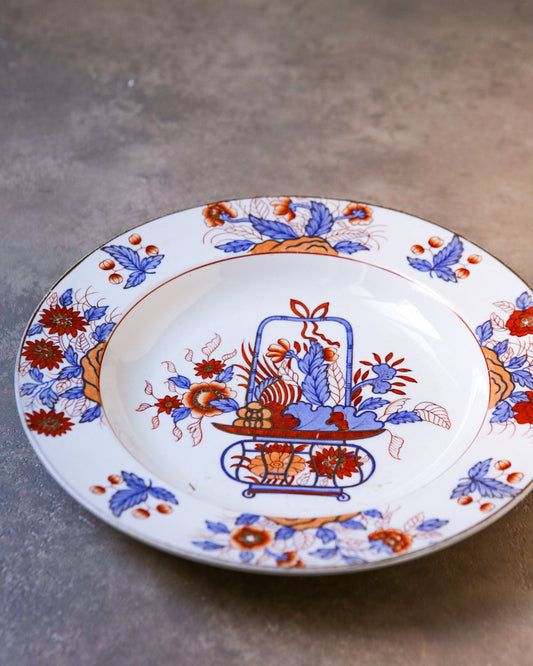 Piatto fondo con vaso fiori celesti e arancione