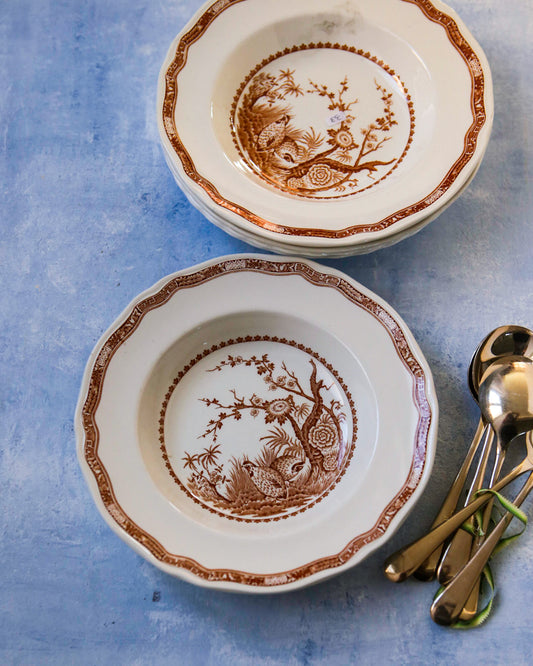 Set tre piatti cupi con decoro quaglie