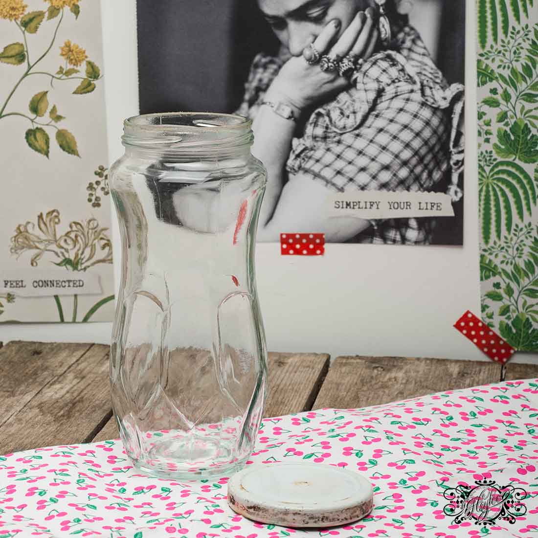 Toschi glass jar with metal cap