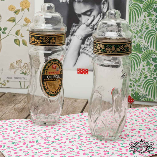 Pair of glass advertising jars branded Toschi
